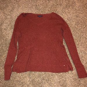 Burnt orange colored sweater